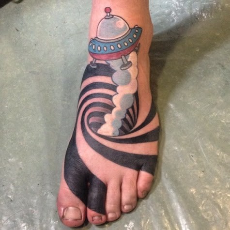 3D spaceship on foot tattoo