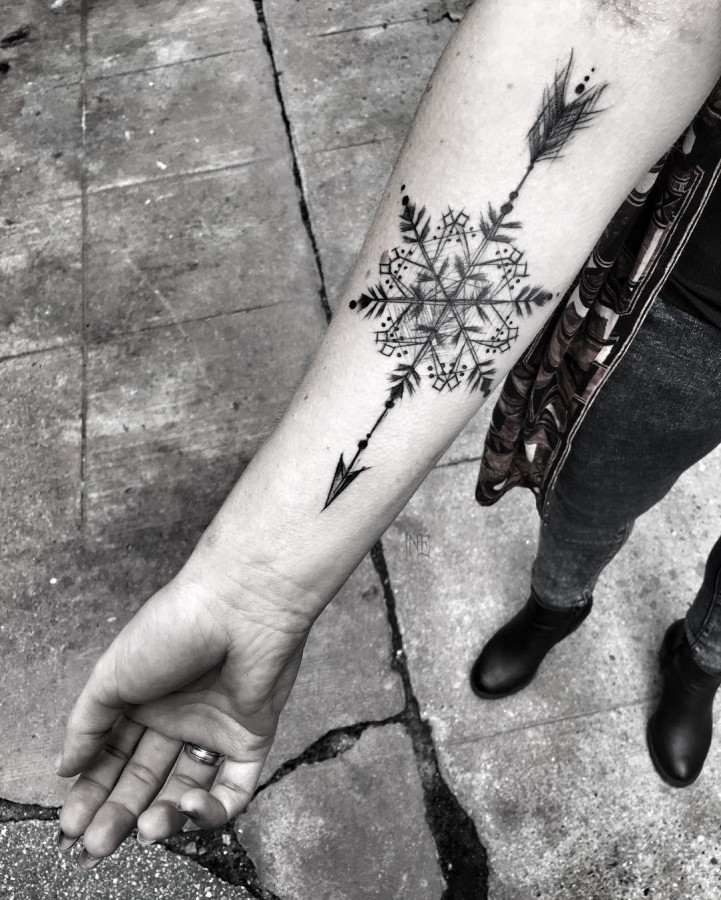 snowflake arrow sketch style tattoo by ineepine
