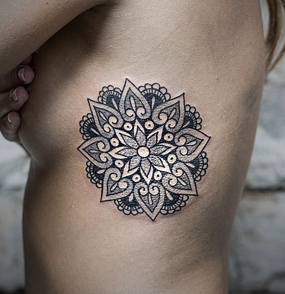 blakc and white mandala tattoo