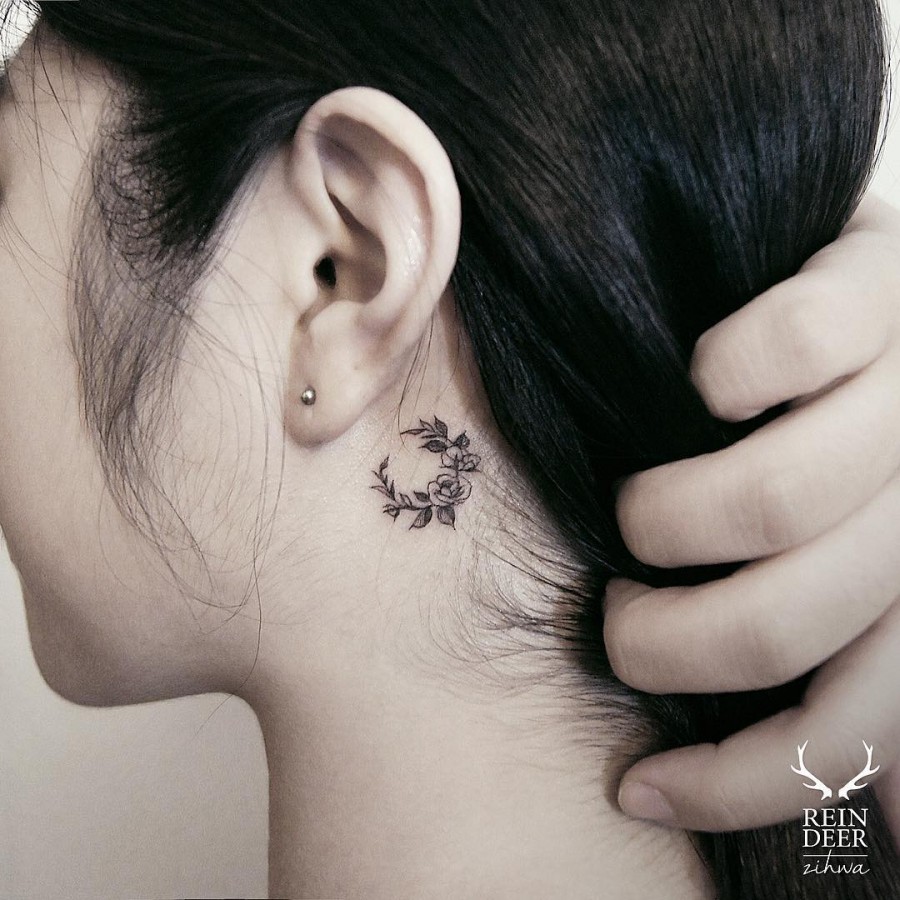 cute-behind-the-ear-flower-arrangement-tattoo