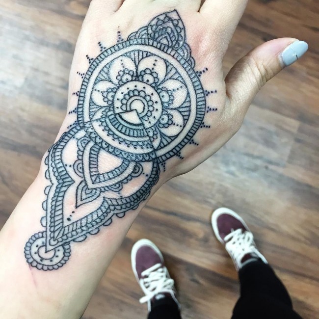 hand mandala tattoo