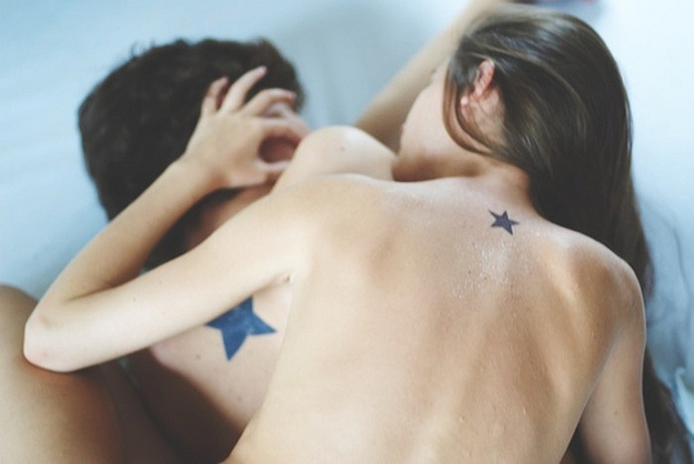 matching black star couples tattoos