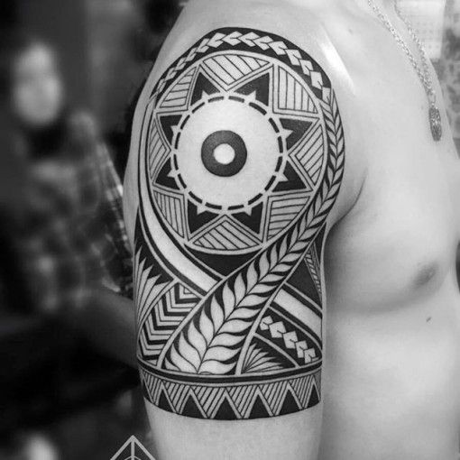 sun tribal tattoo