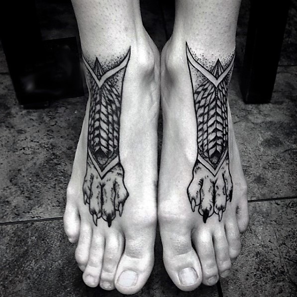 wolf-paw-print-on-feet-tattoos