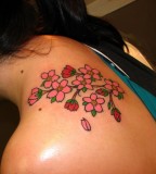 women tattoo designs back flowers