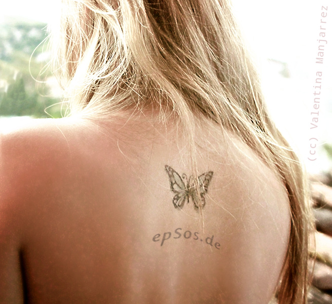 women tattoo designs butterfly on back