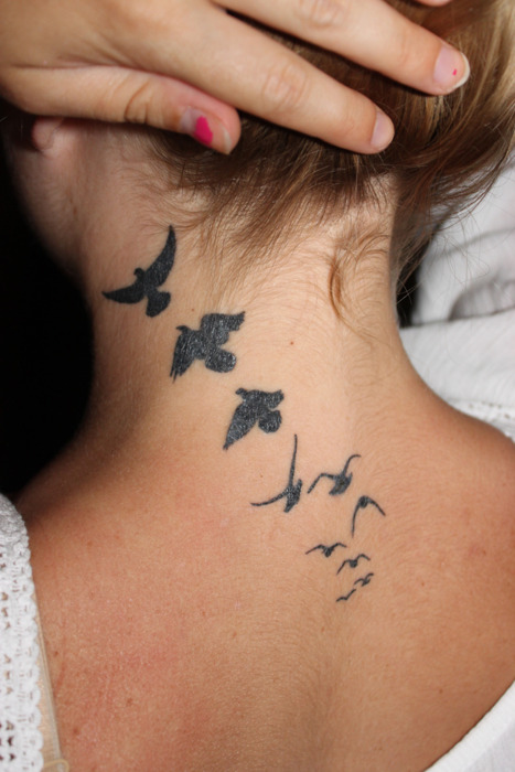 neck tattoos bird