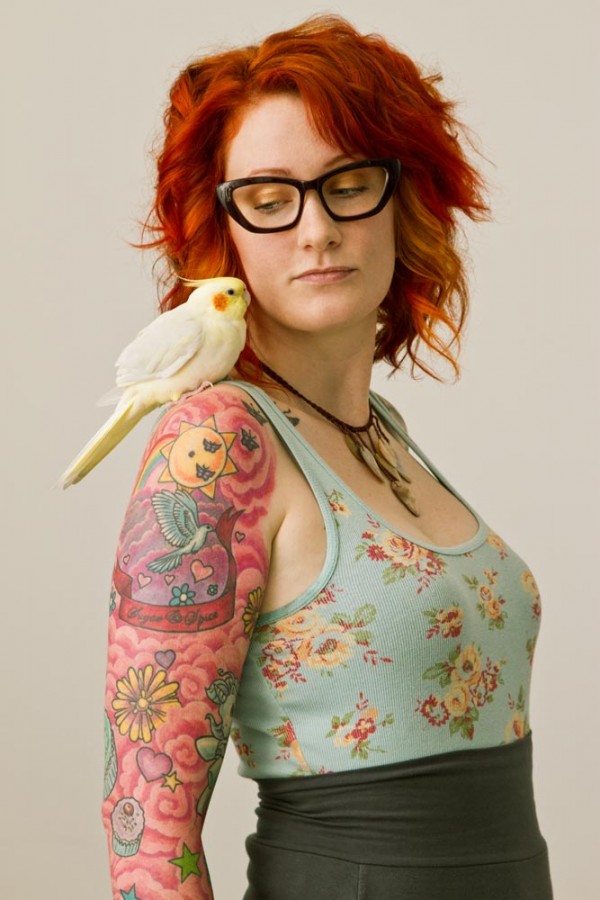 red hair girl tattoo girl with a bird