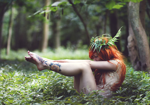 red hair girl tattoo wild nature