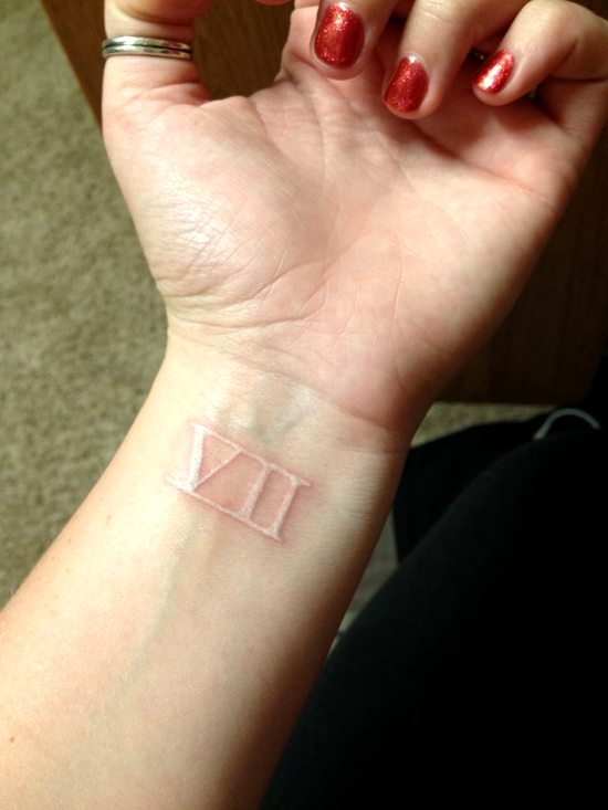 white ink tattoo lucky seven