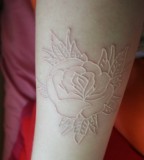 white ink tattoo rose