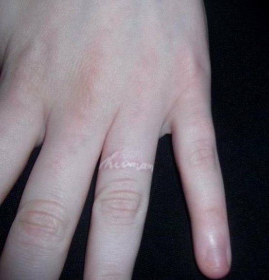 white ink tattoo the wedding ring finger