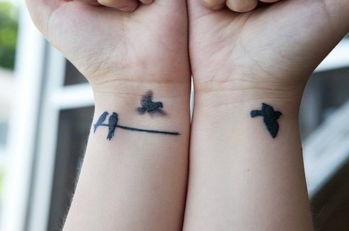 elegant bird tattoo birds on wire