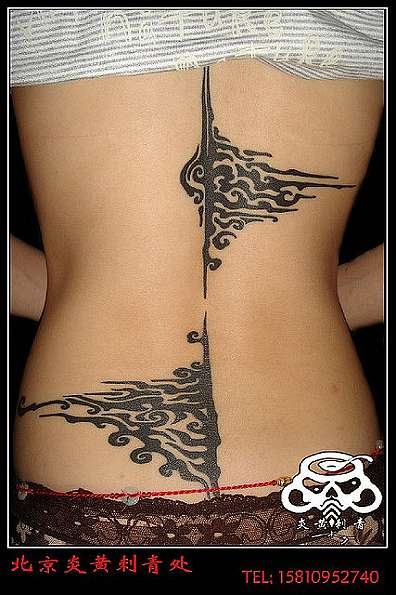 energy tattoo spine tattoo