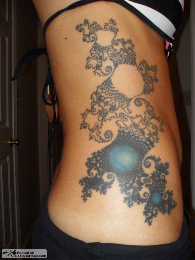 fractal tattoo black and blue fractal on ribs