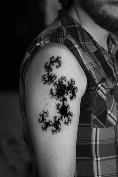 fractal tattoo black fractal on arm