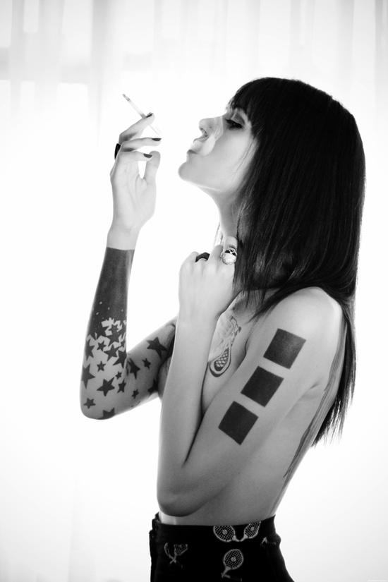 geometric abstract tattoo minimalist black squares stars smoking lady