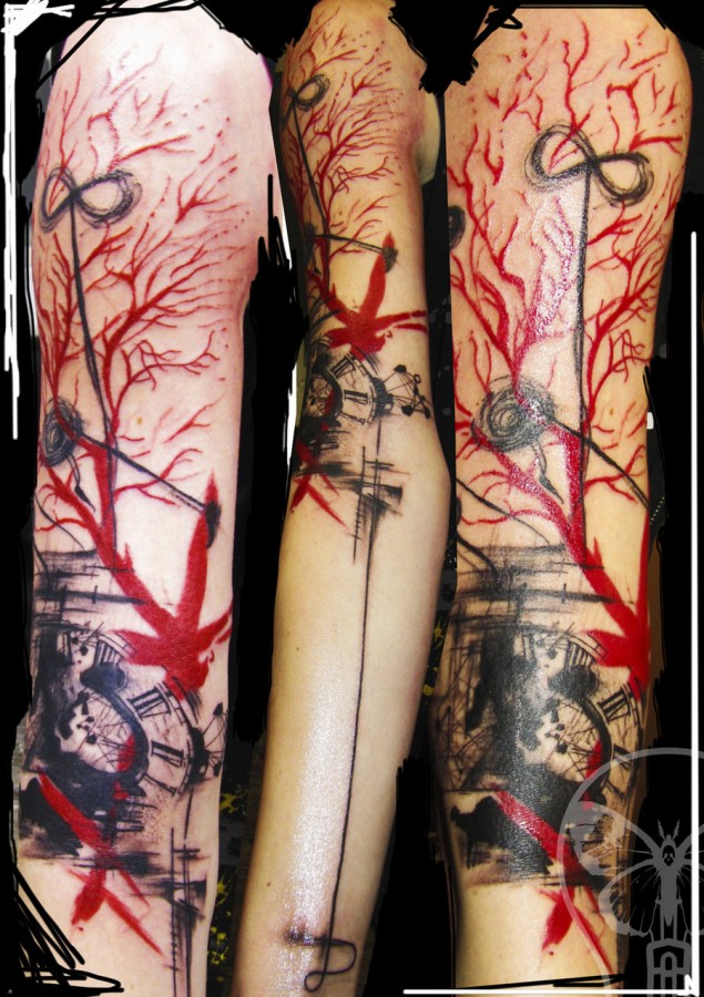 geometric abstract tattoo red and black sleeve