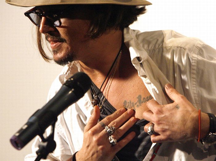 johnny depp tattoo lilly rose on chest