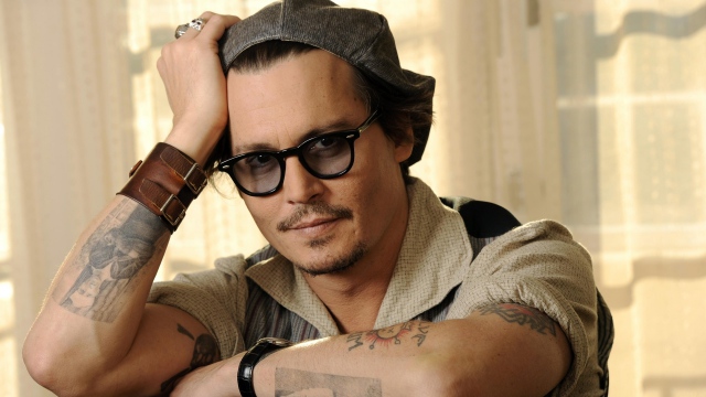 johnny depp tattoo portray on arm