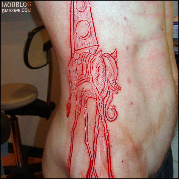 red ink tattoo dali elephant