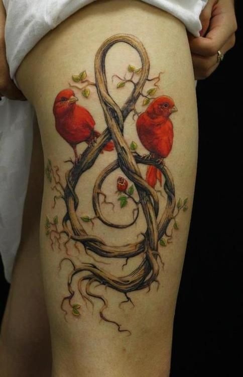 red ink tattoo two red birds treble clef