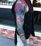 tattoo by Mike DeVries animals sleeve