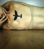 travel tattoo black plane