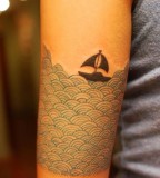 travel tattoo small boat