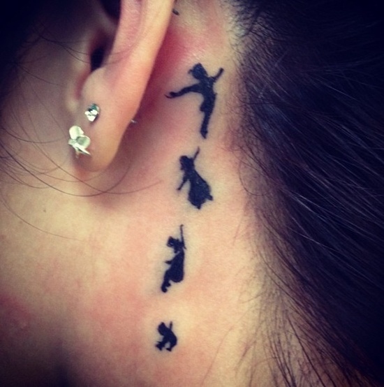 behind ear tattoo peter pan black work