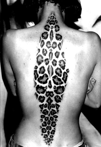 black leopard print tattoo rhombus on back