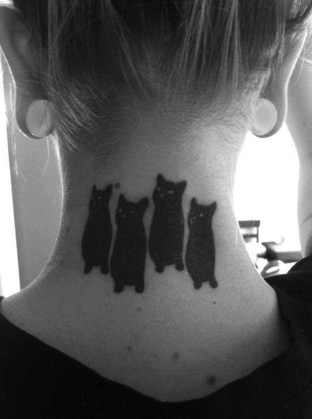 blackwork tattoo four cats on back neck