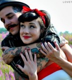 cute tattoed couple fancy moustache