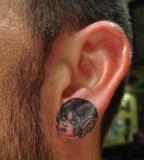 ear tattoo girl head