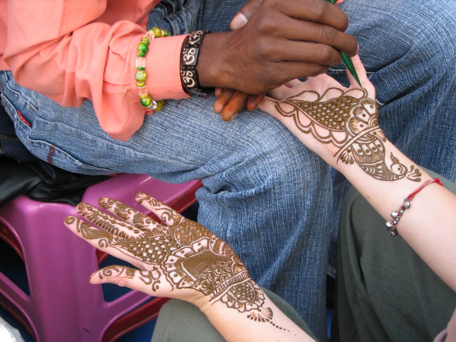 henna application on hand in process