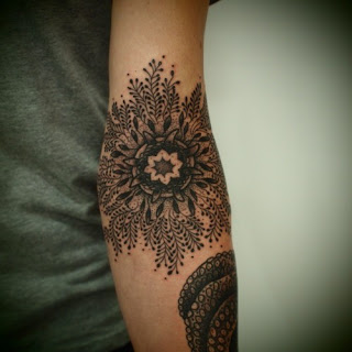 lace tattoo inner arm flower