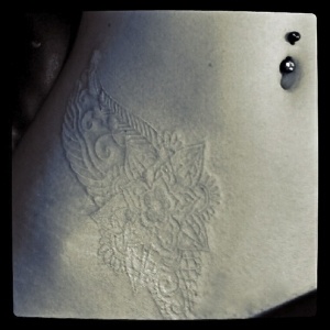 lace tattoo white ink belly