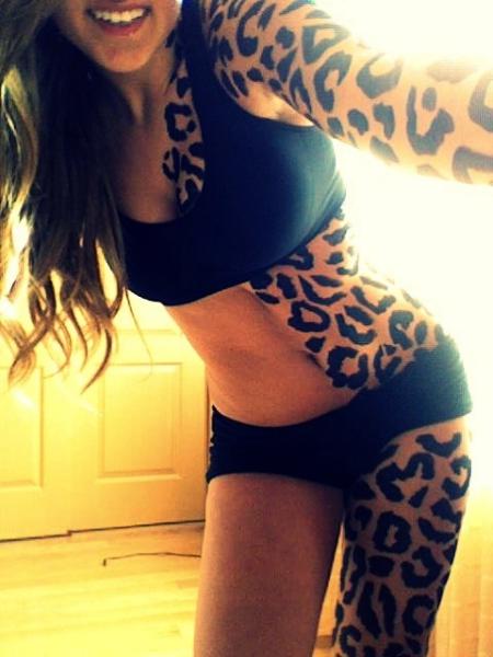 leopard print tattoo half body tattoo