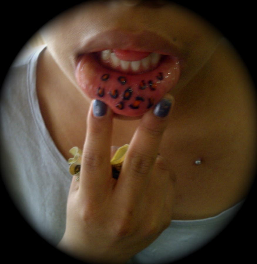 leopard tattoo print on lip