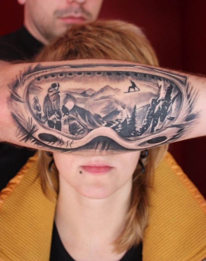 mountain reflection into ski goggles tattoo