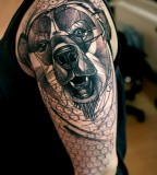 peter aurisch geometric bear on upper arm