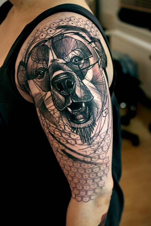 peter aurisch geometric bear on upper arm