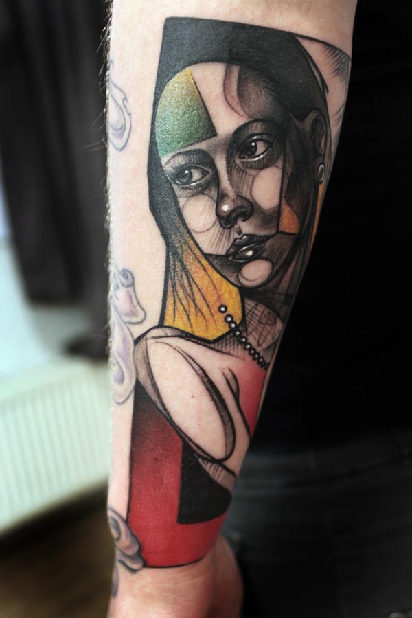 peter aurisch tattoo geometric girl on arm