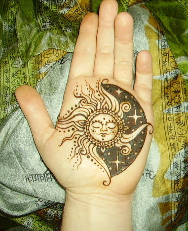 sun and moon on hand