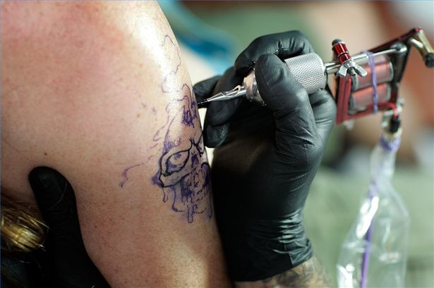 violet skull tattoo in process