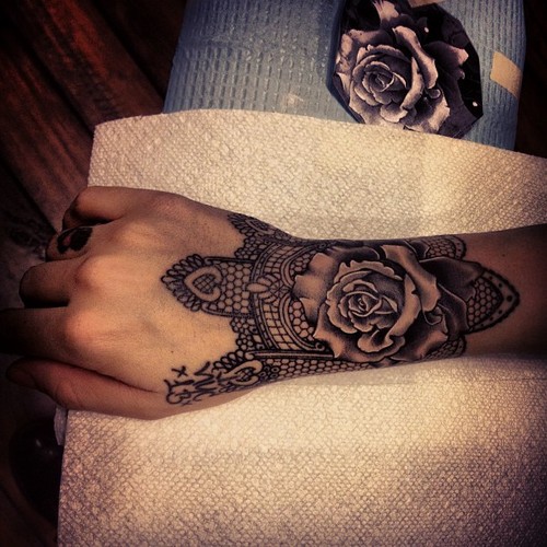 wrist tattoo rose