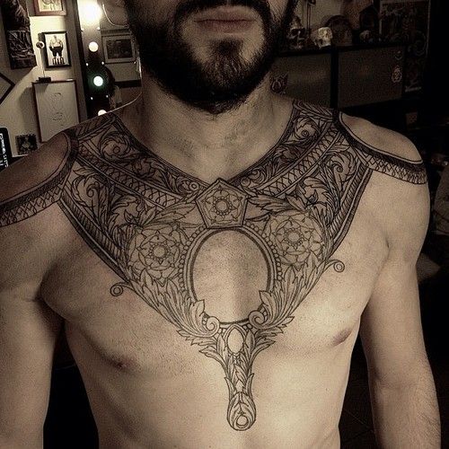 beautiful linework chest tattoo design for men