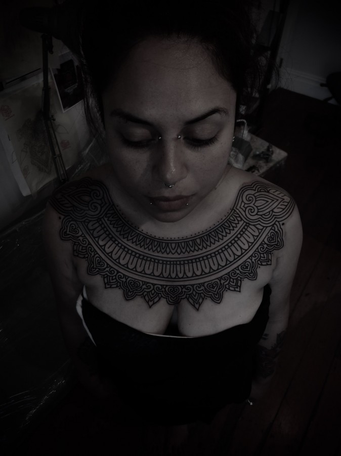 chest tattoo by guy le tattooer