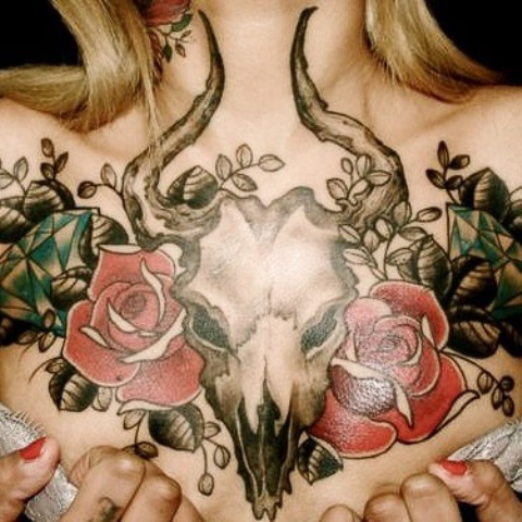 classic goat skull and rose tattoo on chest