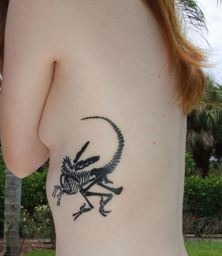 dino skeleton tattoo blackwork